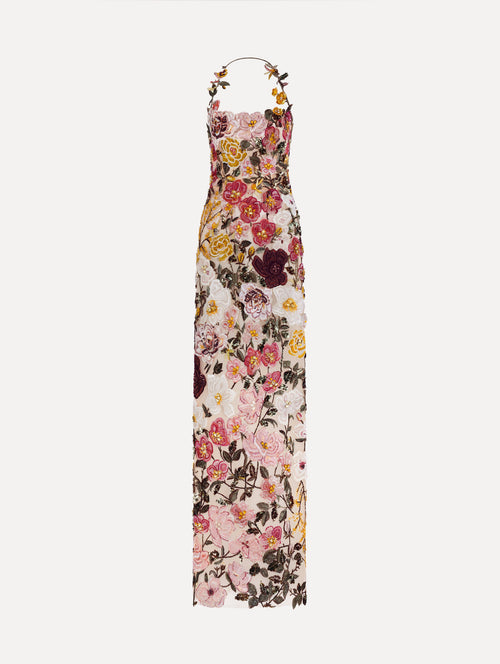 The model is wearing the beaded mixed botanical embroidered gown in multi-color with a halter neckline and floral detailing.