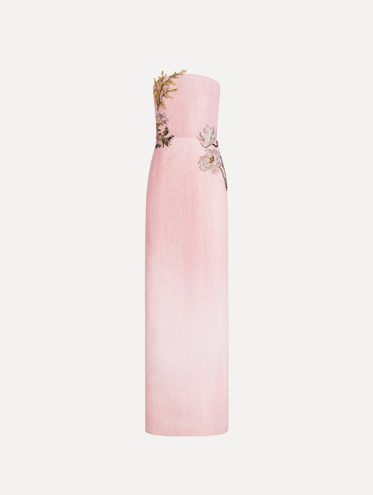 The model is wearing the beaded mixed botanical embroidered column gown with floral detailing and a strapless silhouette in the color blush.