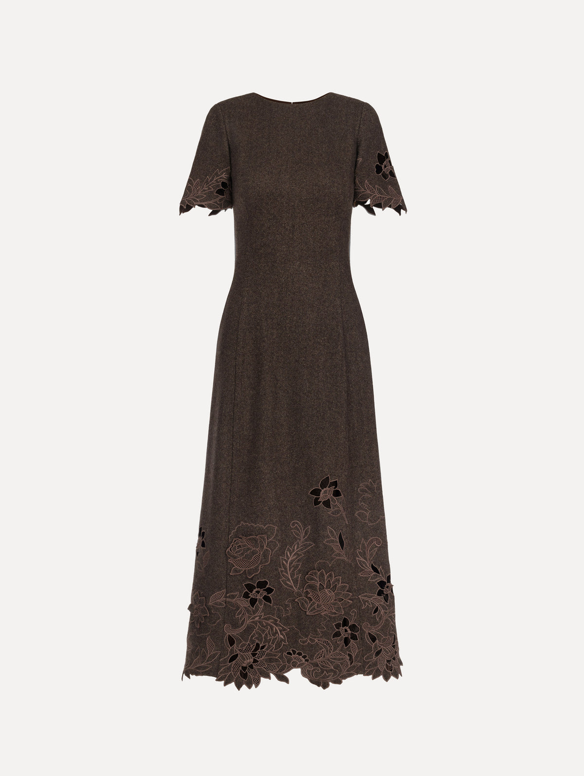 The model is wearing the peony cutout twill herringbone dress with short sleeves in a brown wool-cashmere blend.