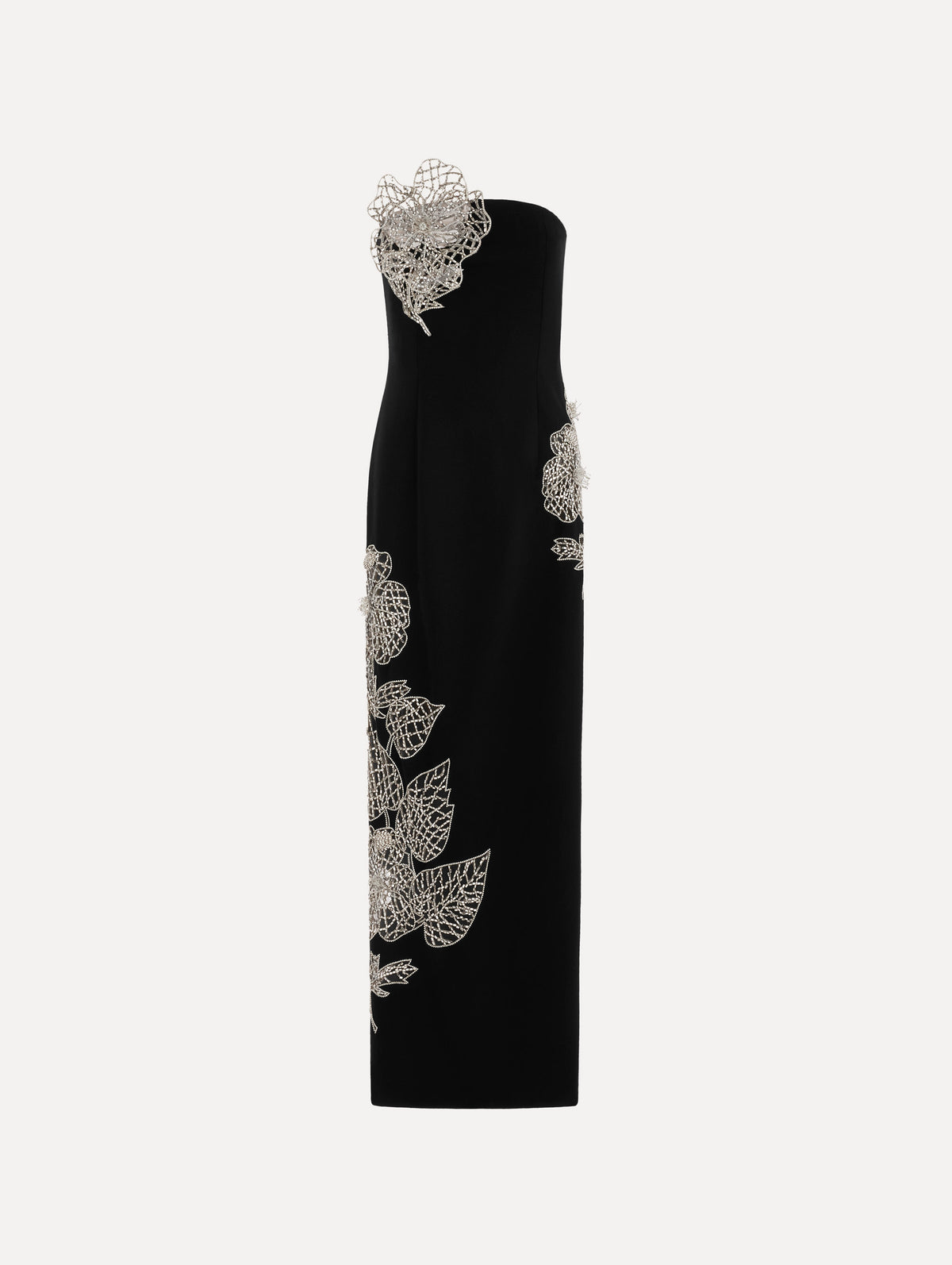 The model is wearing the crystal leaves embroidered cocktail dress with a strapless silhouette in the color black.