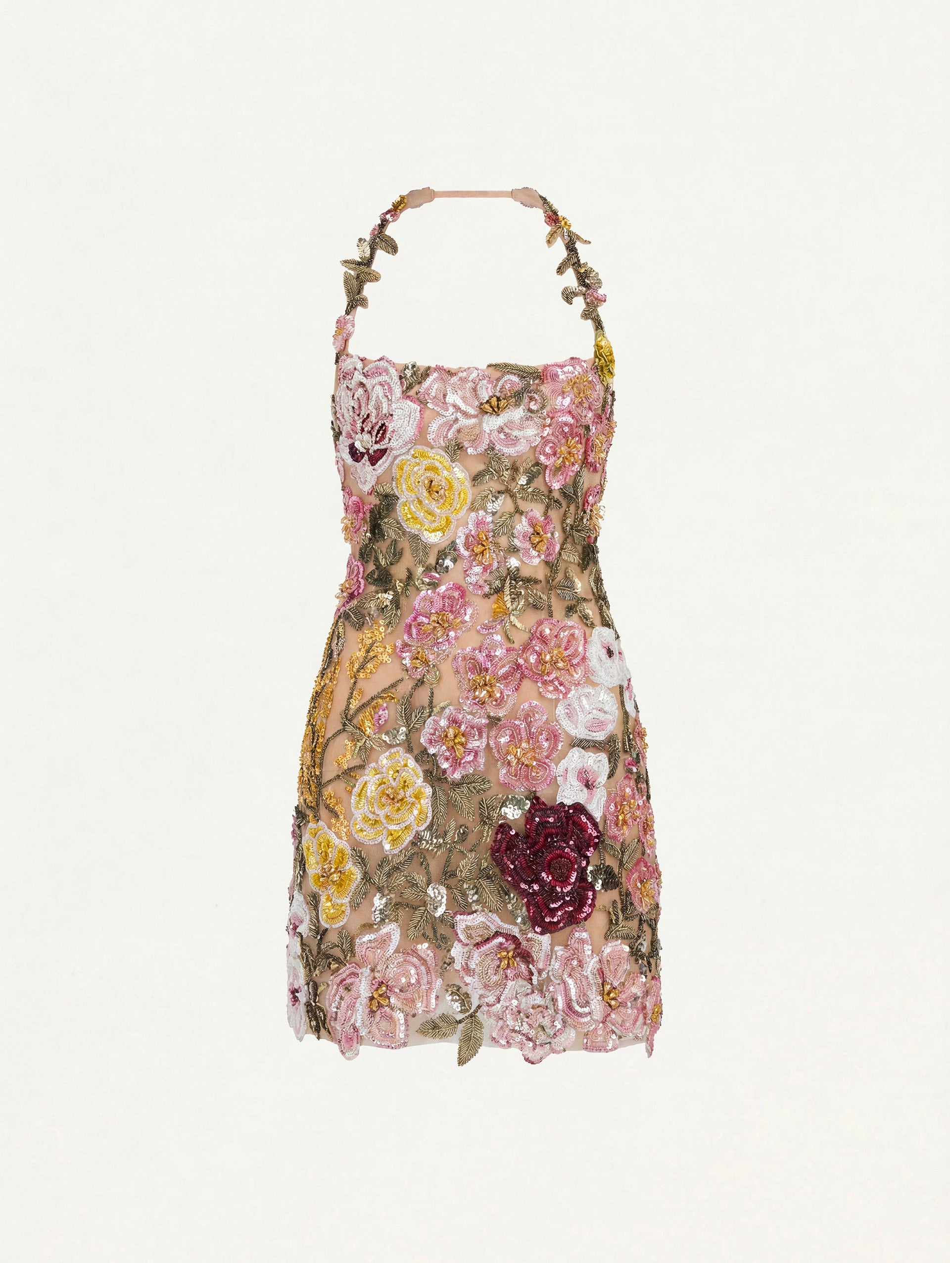 The model is wearing the beaded mixed botanical embroidered cocktail dress with a halter neckline in a multi-color palette.