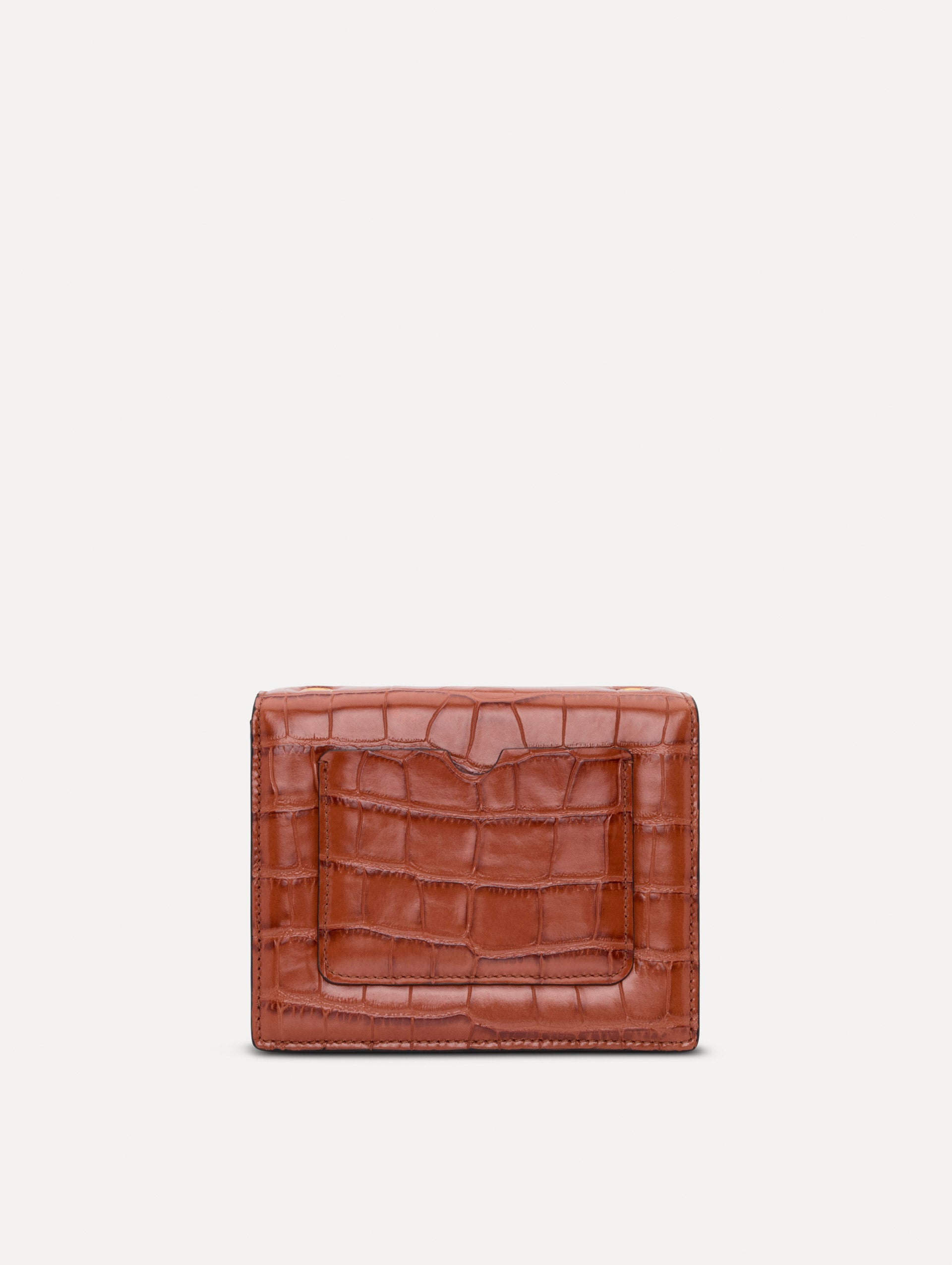 The Embossed Mini TRO Bag in the color cognac. Back view. 