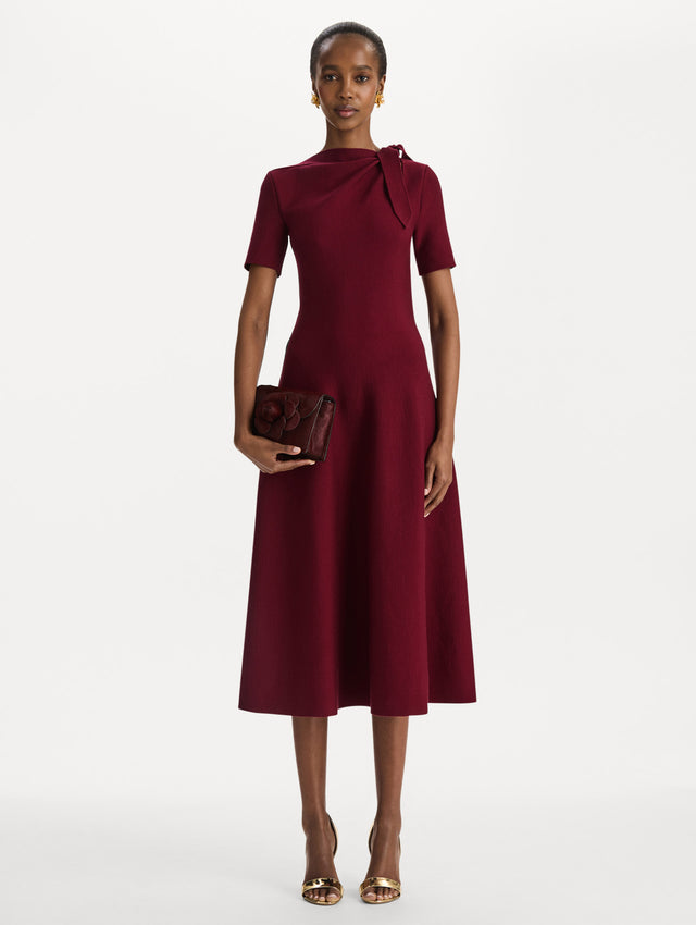 The Haircalf Mini TRO Bag in the color bordeaux. Front view.