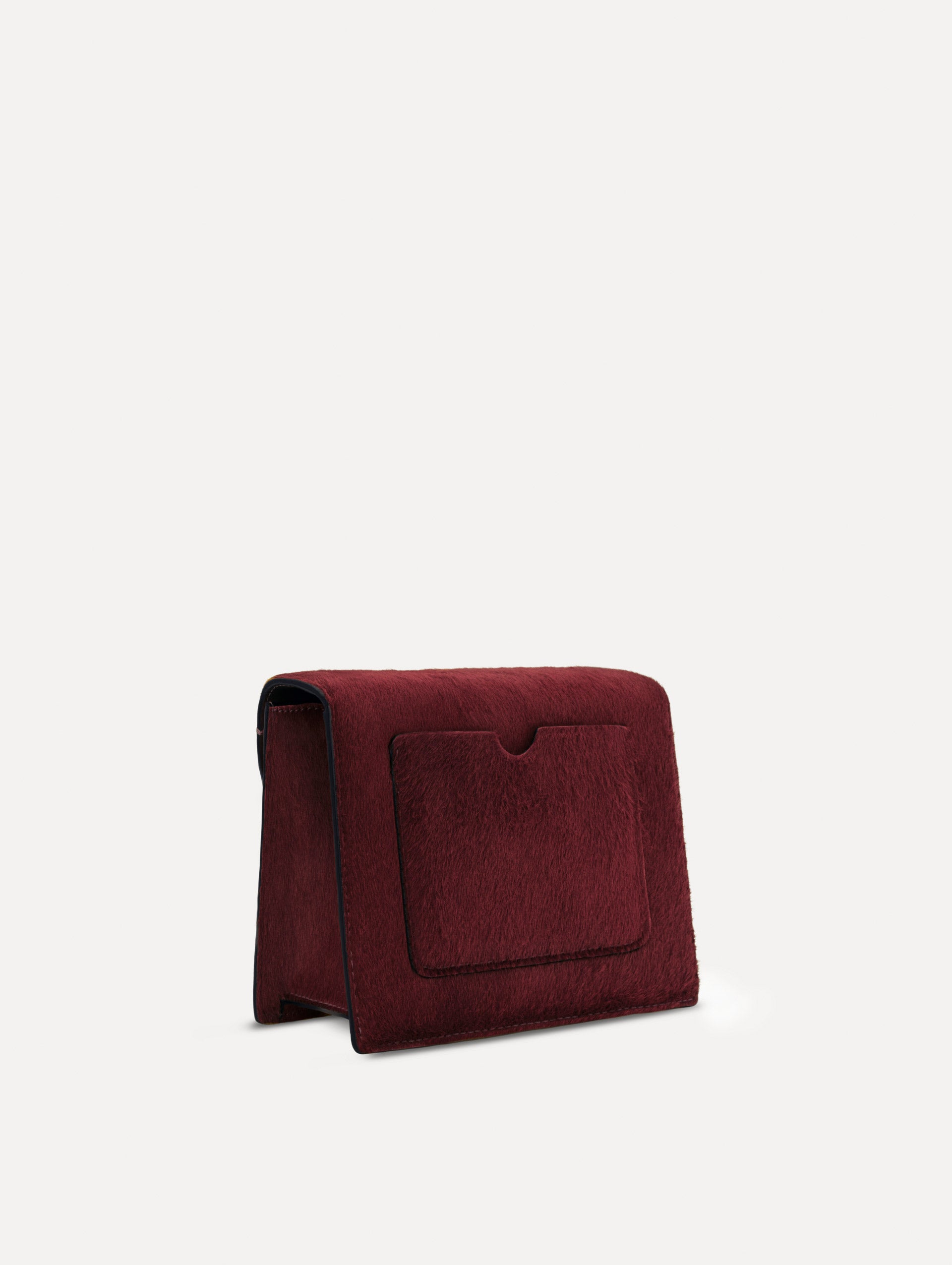 The Haircalf Mini TRO Bag in the color bordeaux. Back view.