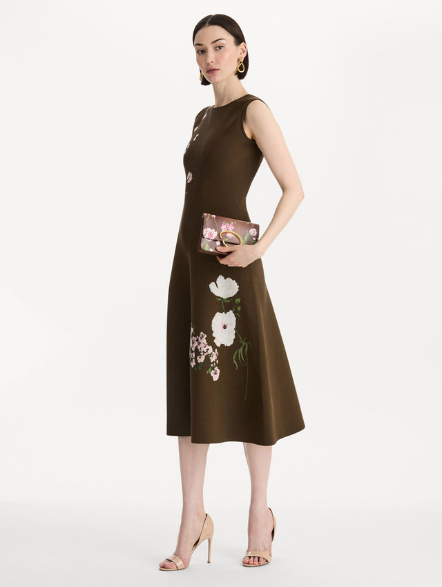 The Mixed Botanical Printed O Pochette in the color brown. Front view.