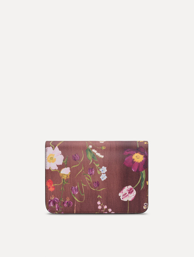 The Mixed Botanical Printed O Pochette in the color brown. Back view.