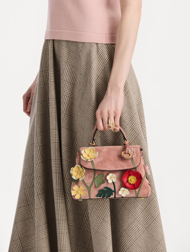 The Mini Poppy in Suede in the color blush. Front view.