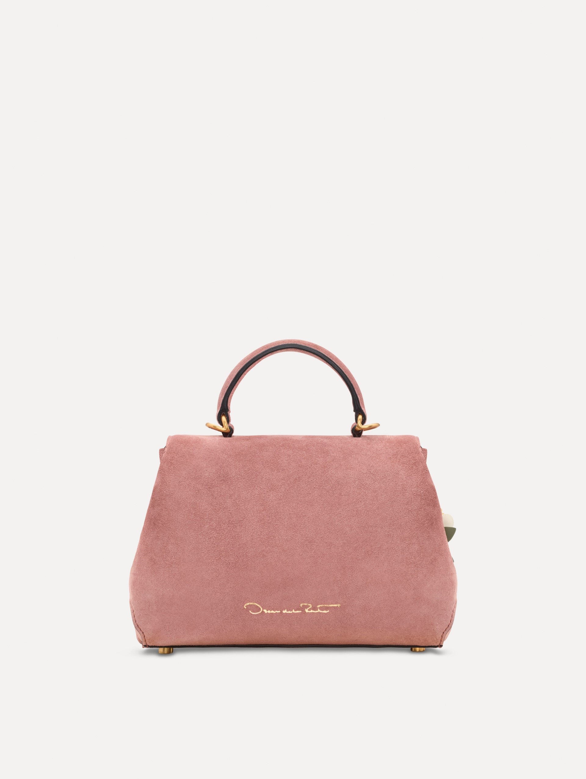 The Mini Poppy in Suede in the color blush. Back view.