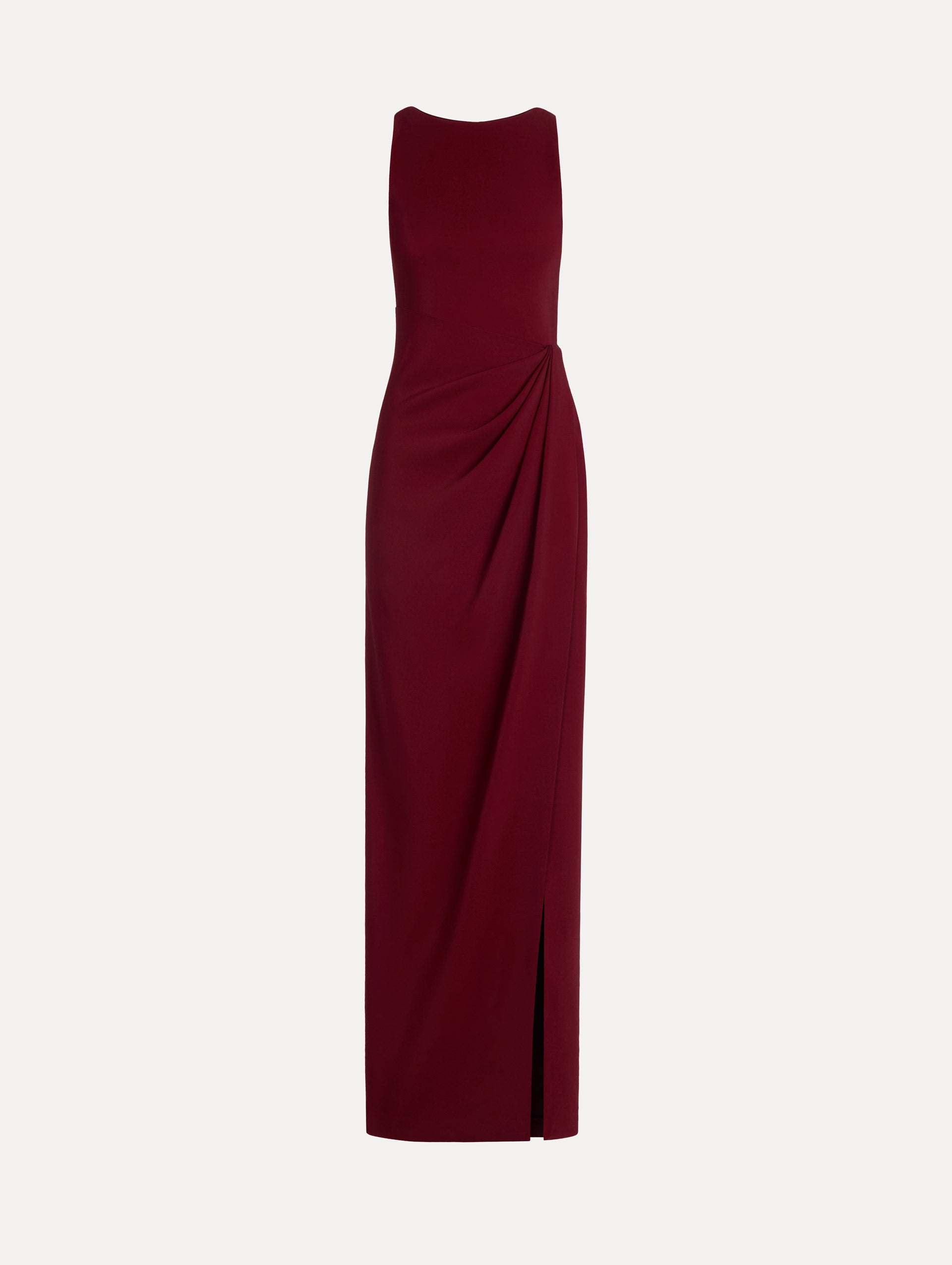 The model is wearing the drape-detailed cady gown with a sleeveless silhouette in the color claret.