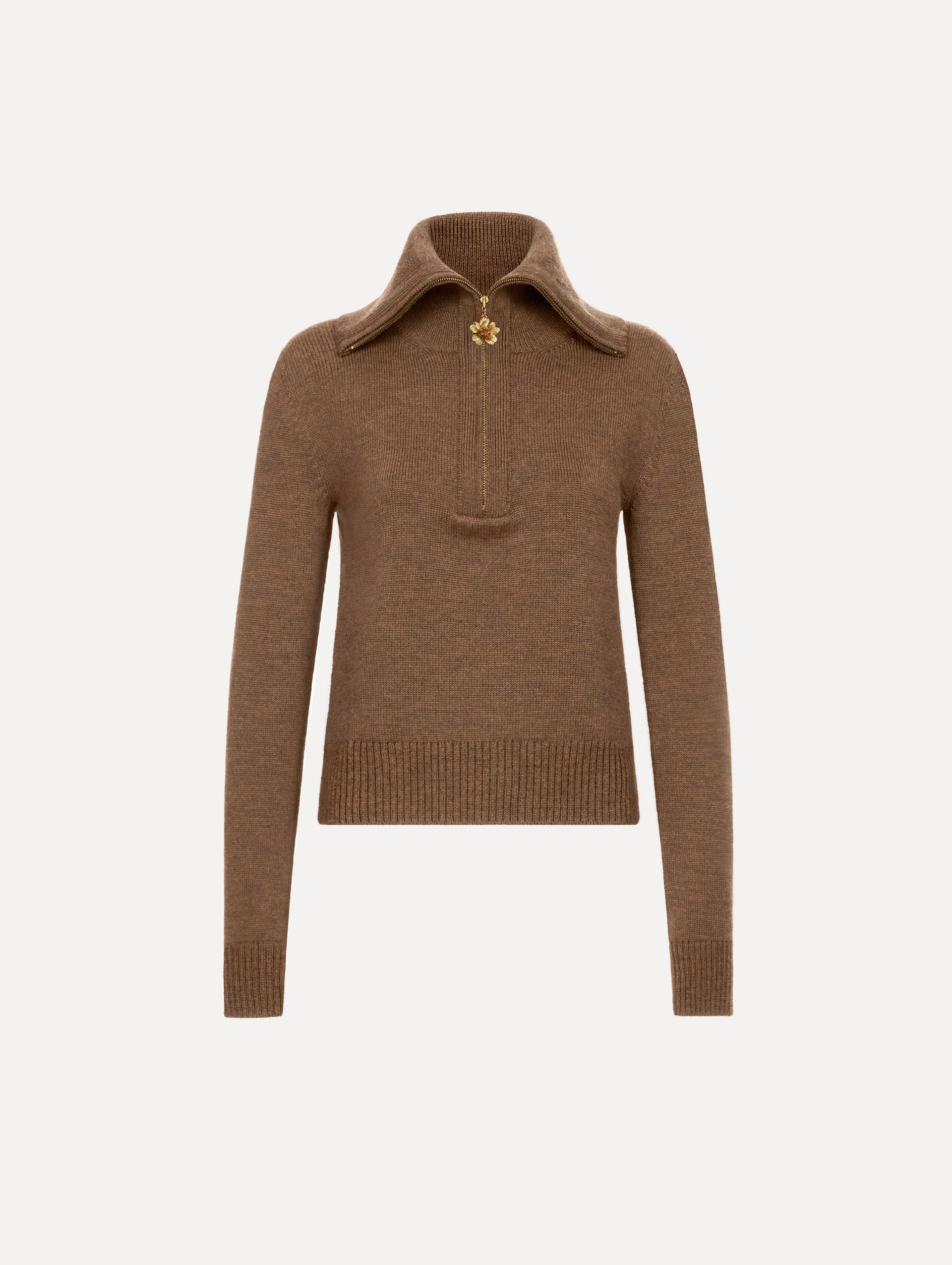The model is wearing the double collar double zip pullover in the color brown with a quarter-zip closure.