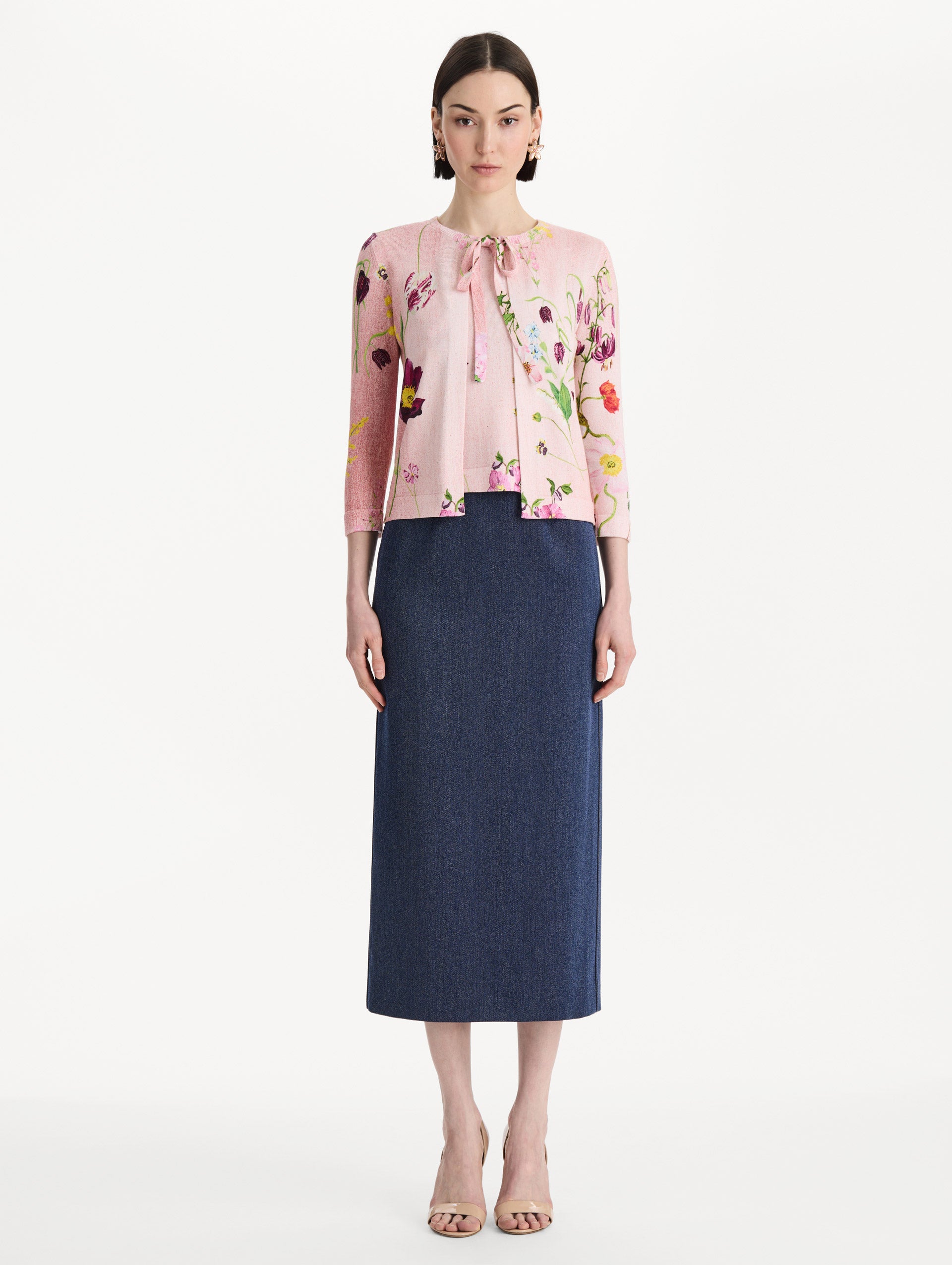 The model is wearing the mixed botanical tie-neck cardigan with an all-over floral print in blush multi. Front view.