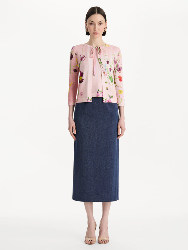 The model is wearing the mixed botanical tie-neck cardigan with an all-over floral print in blush multi. Front view.