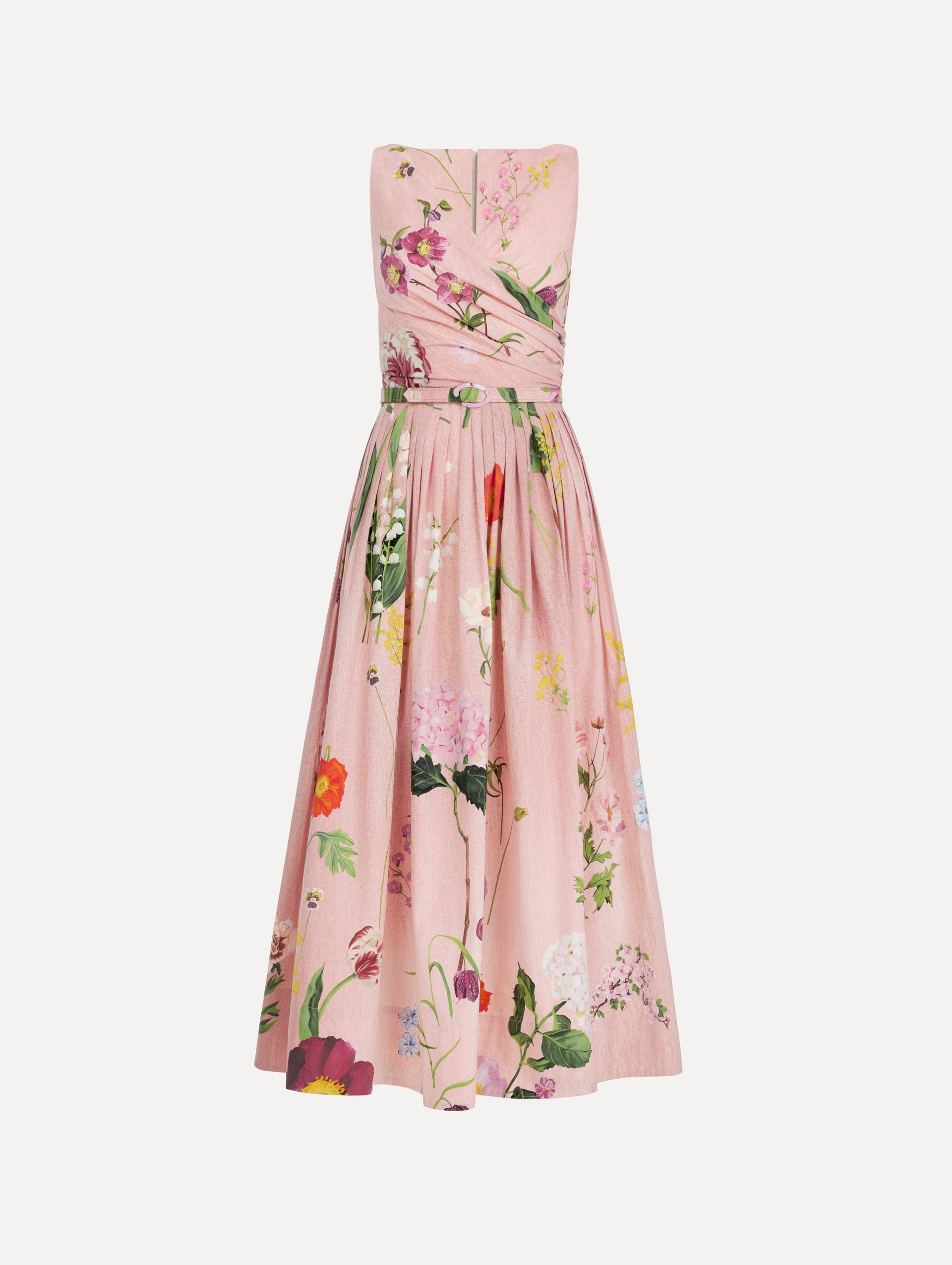 The model is wearing the mixed botanical cotton poplin draped dress with waist detailing and an all-over floral print in blush multi.