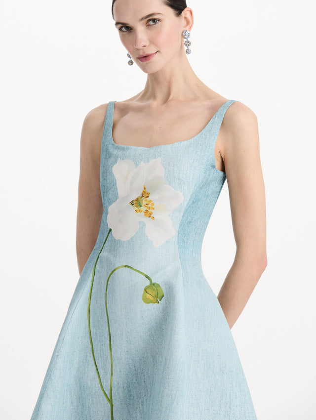The model is wearing the ombré peony faille dress with a sleeveless scoop neckline in white and blue. Zoom view. 