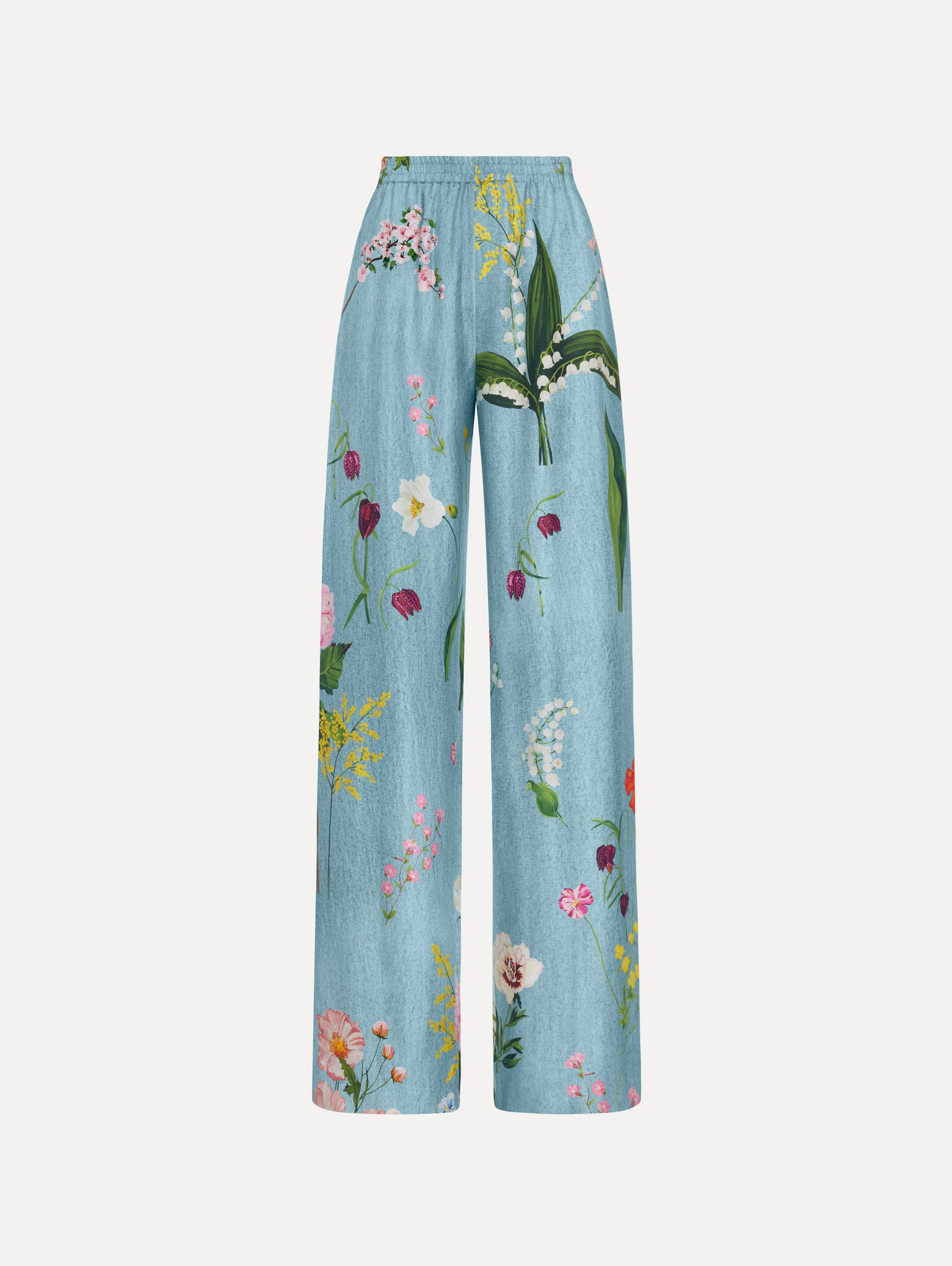 The model is wearing the mixed botanical silk twill pant in the color blue multi.