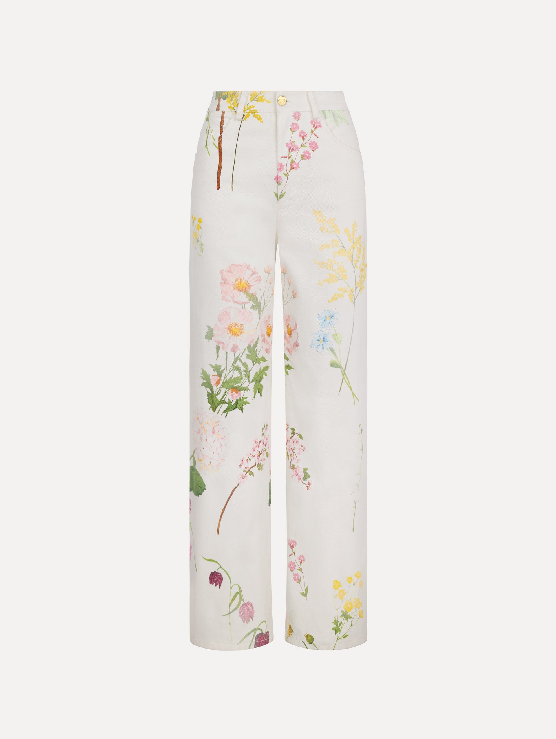 The model is wearing the faded mixed botanical denim pant with a washed floral print in cotton denim.