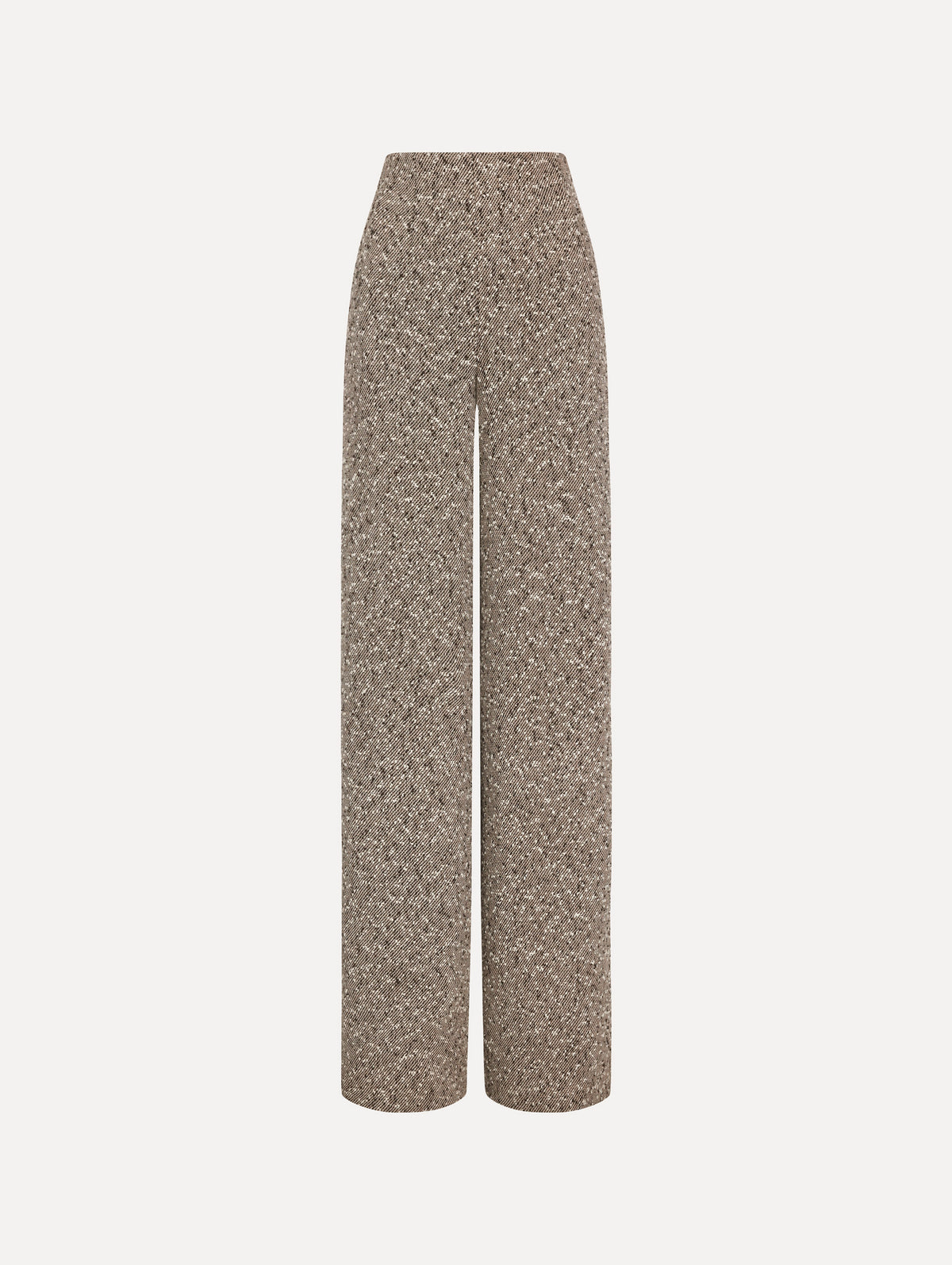 The model is wearing the slubby wool tweed gauze pant with a tailored silhouette in an ivory and brown palette. 