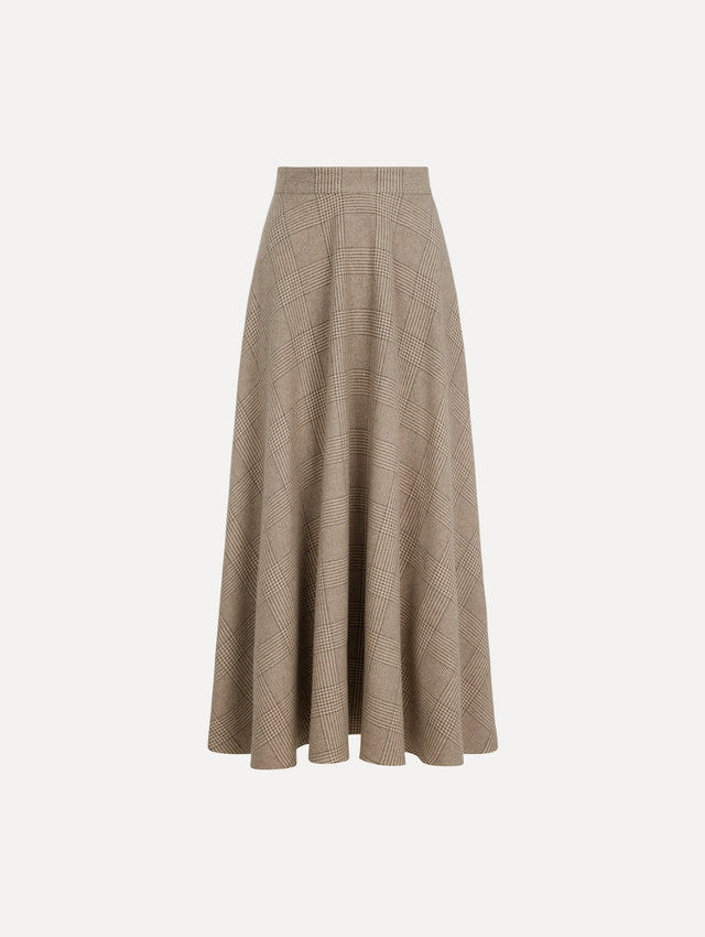 The model is wearing the plaid cashmere-blend skirt with a glen plaid pattern.