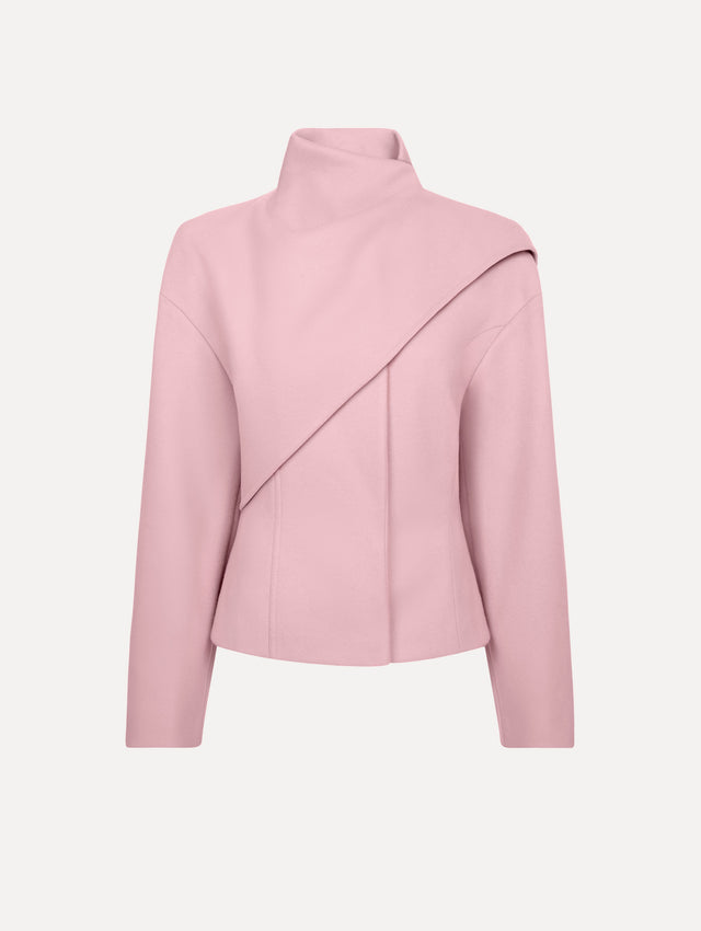 The model is wearing the drape-detailed wool coat with long sleeves in the color blush.