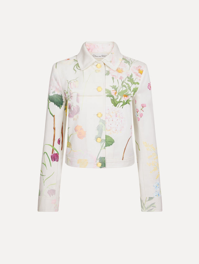 The model is wearing the faded mixed botanical denim jacket in the color white multi.