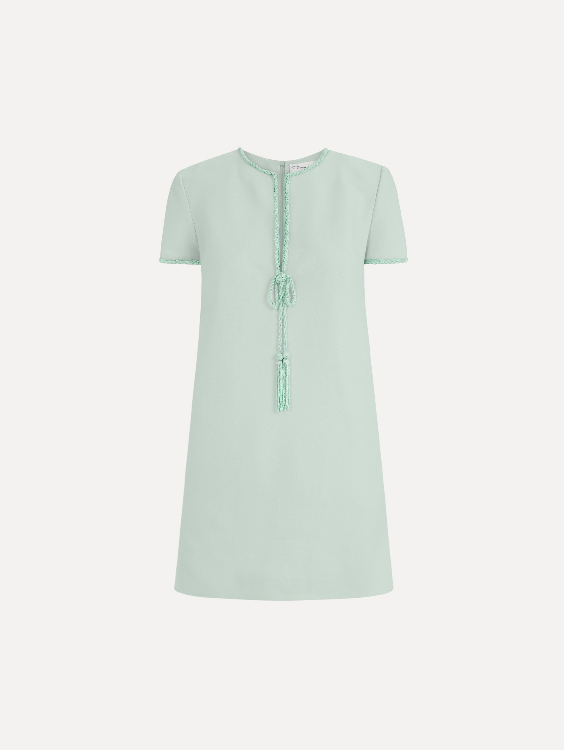 The Beaded Bow-Detail Shift Dress in Saltwater Blue. Featuring a beaded bow detail at the neckline with tassel ties and subtle trim along the edges. Front View.