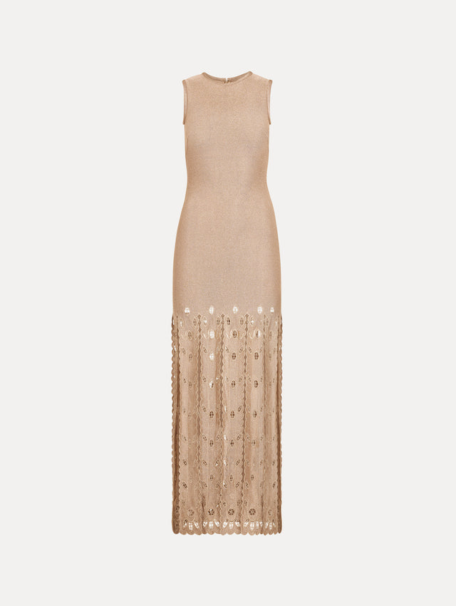 The Pineapple Fringe Metallic Jersey Dress. Featuring shimmering metallic jersey fabrication, a body-skimming silhouette, and pineapple-inspired fringe along the hem. Front View. 