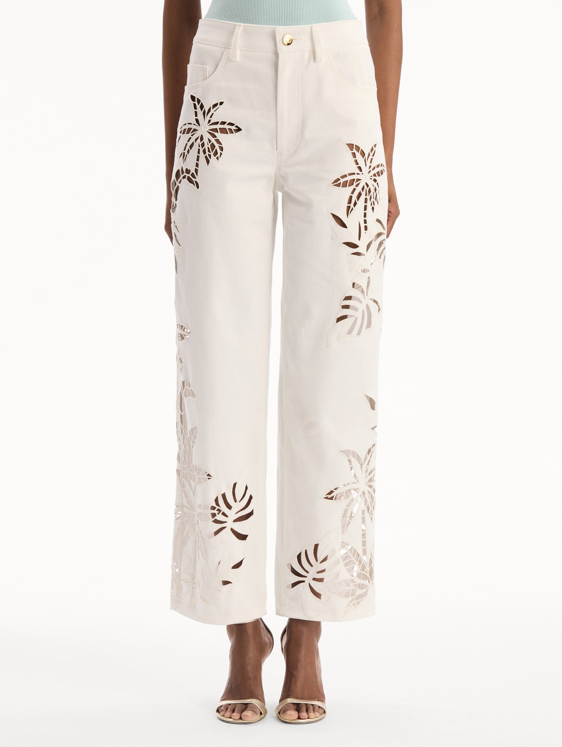 Palm Leaves Cutout Denim Pant in White. front view.