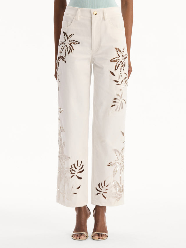 Palm Leaves Cutout Denim Pant in White. front view.
