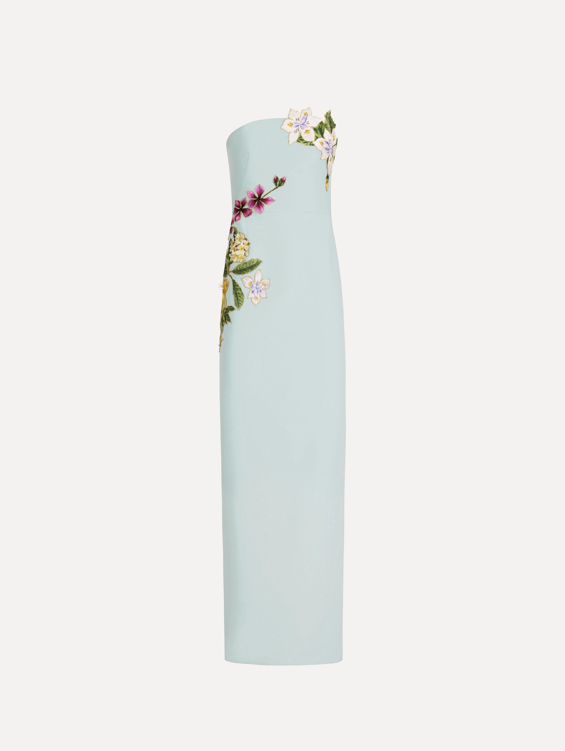 The Dominican Mixed-Floral Embroidered Gown in Saltwater Blue. Featuring Dominican floral embroidery, strapless neckline, and long, column silhouette. Front View.