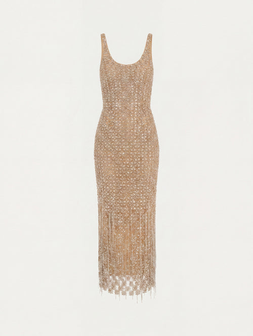 The model is wearing the crystal & glass embroidered cocktail dress with a scoop neckline in the color amber.