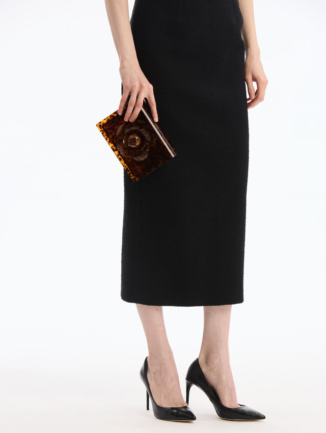 Tortoise Plexiglass Mini TRO Bag (Clutch). Rectangular with central flower detail. Front View.