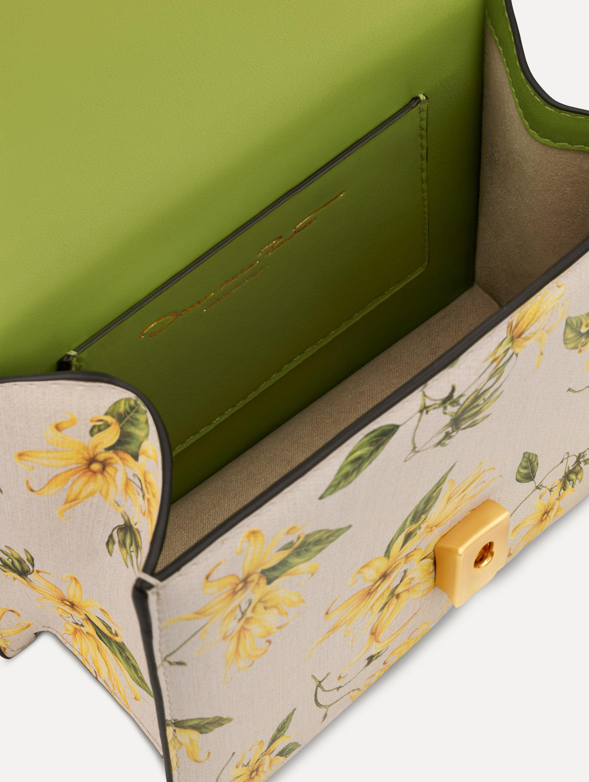 The Ylang Ylang Printed Mini TRO Bag in Yellow. Detail View.