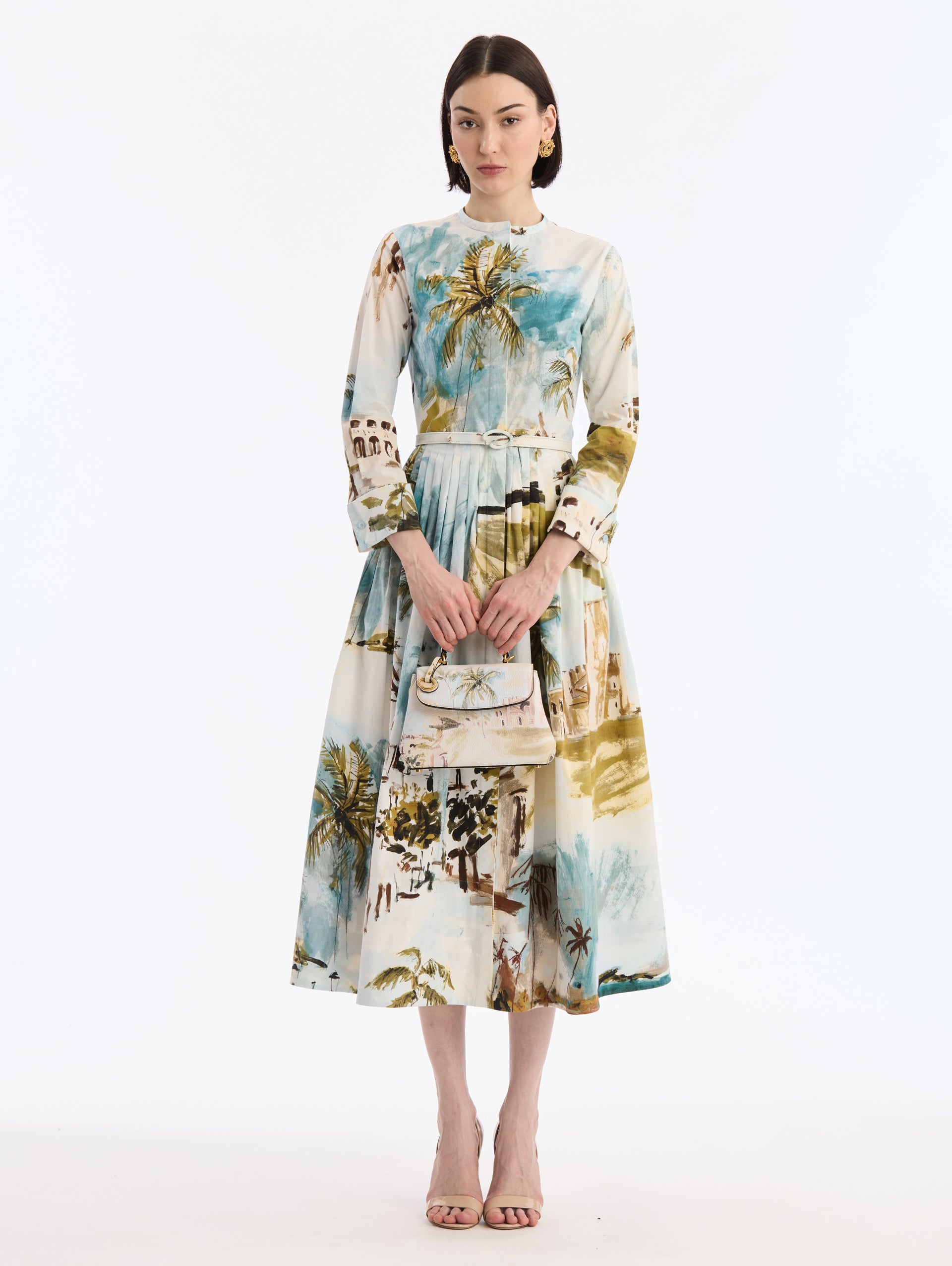 Small leather top handle bag in Saltwater print. Front view.