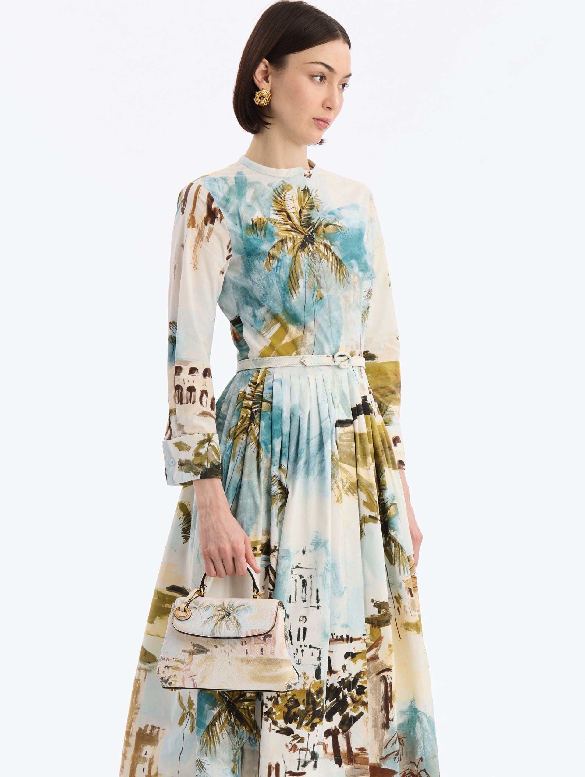 Small leather top handle bag in Saltwater print. Front view.