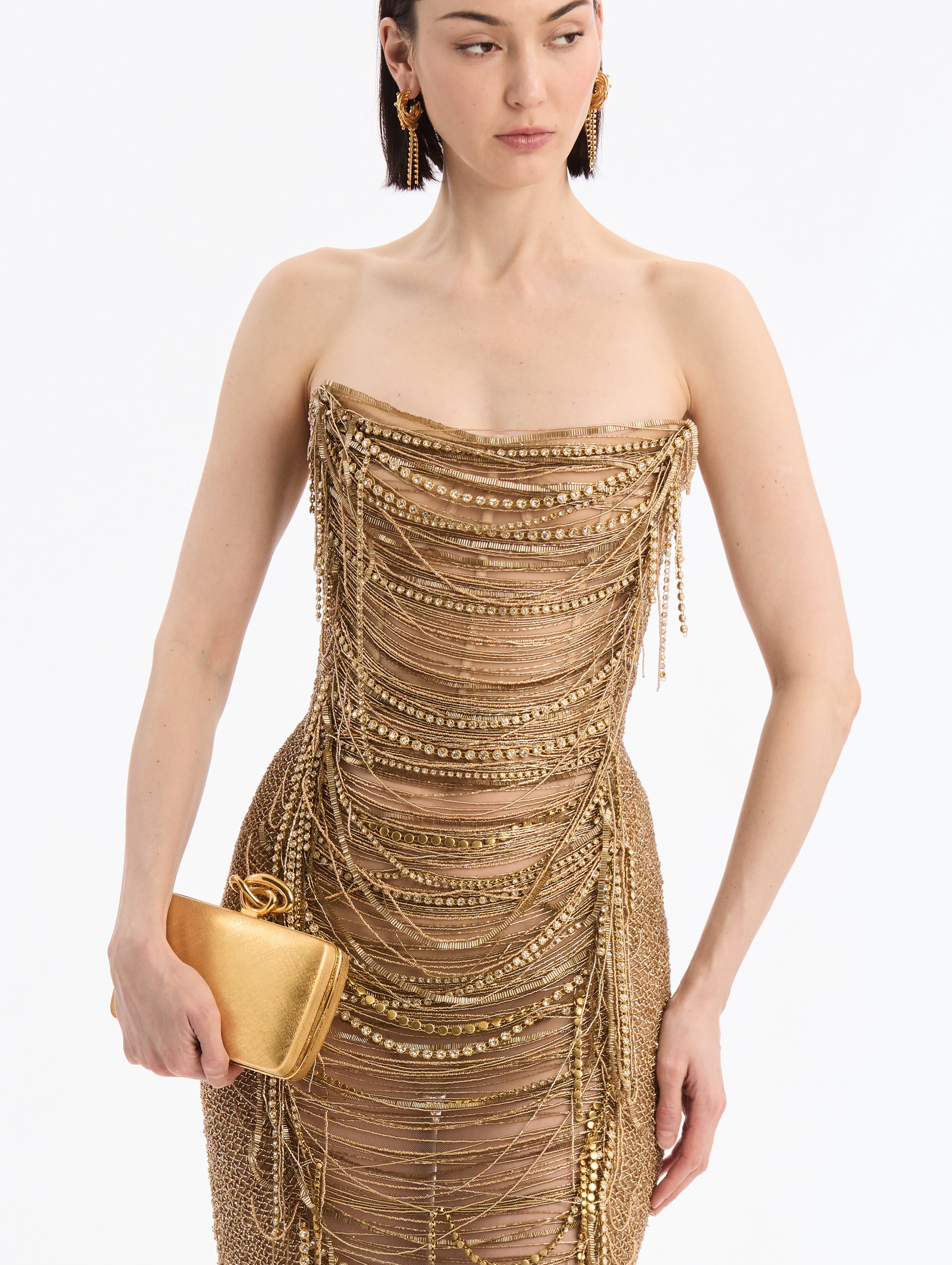 Gold Clutch with Golden Knot Clasp Closure. Side View. 