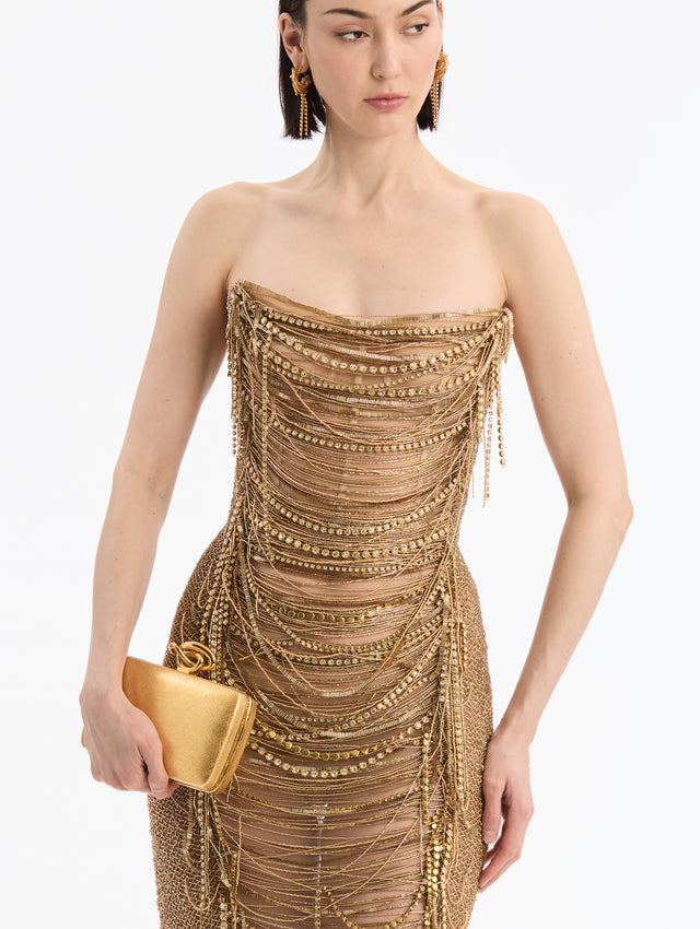 Gold Clutch with Golden Knot Clasp Closure. Side View. 