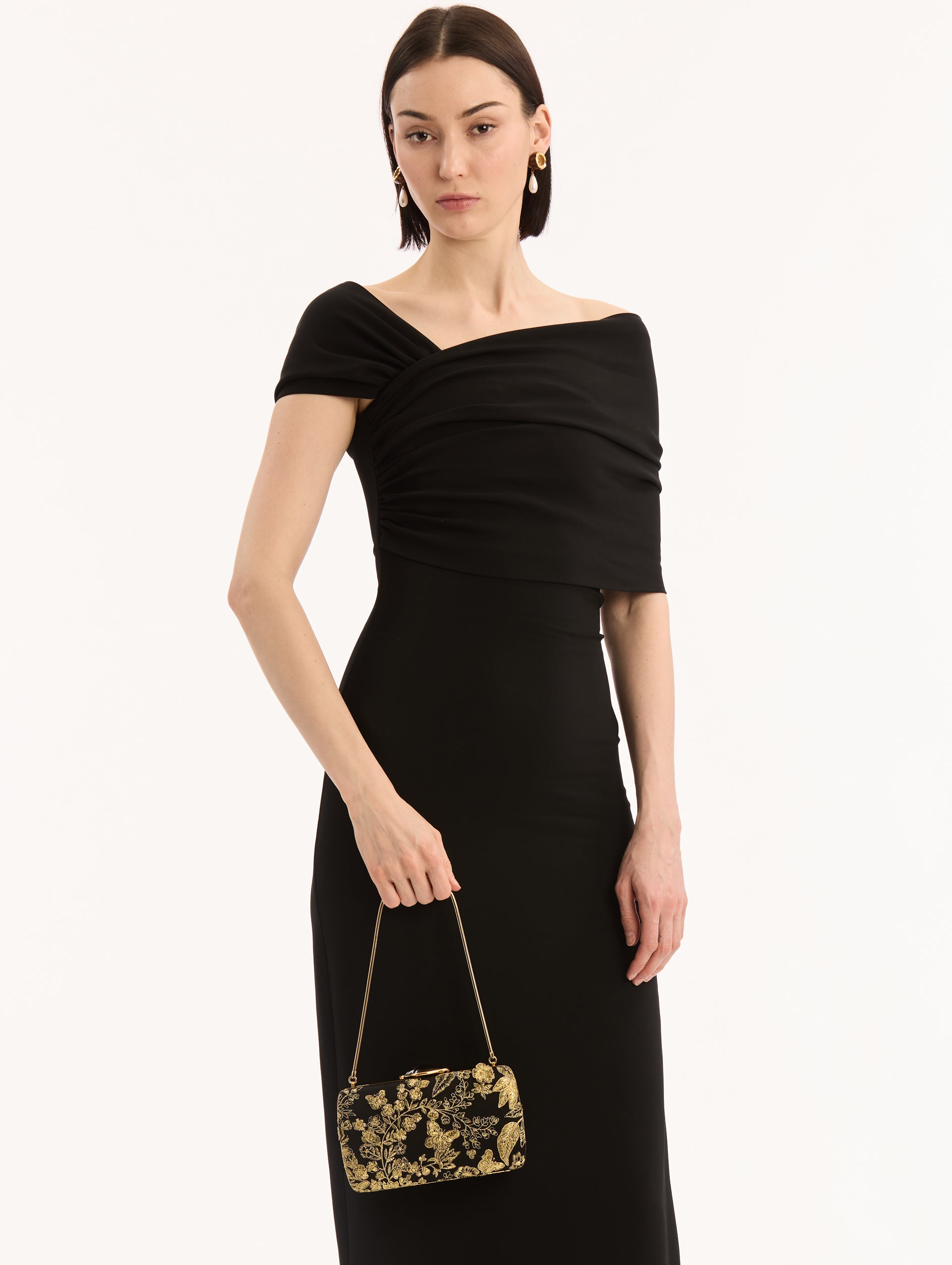 Butterfly Embroidered O Minaudière Shoulder Bag. Black with gold detail. Thin gold strap. Front View. 