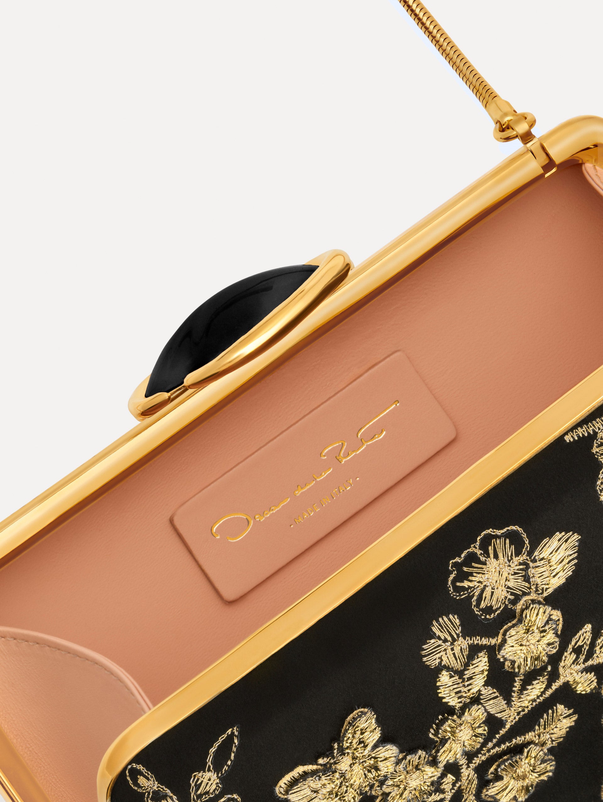 The Butterfly Embroidered O Minaudière in Black Satin with Gold Butterfly Embroidery. Detail View.