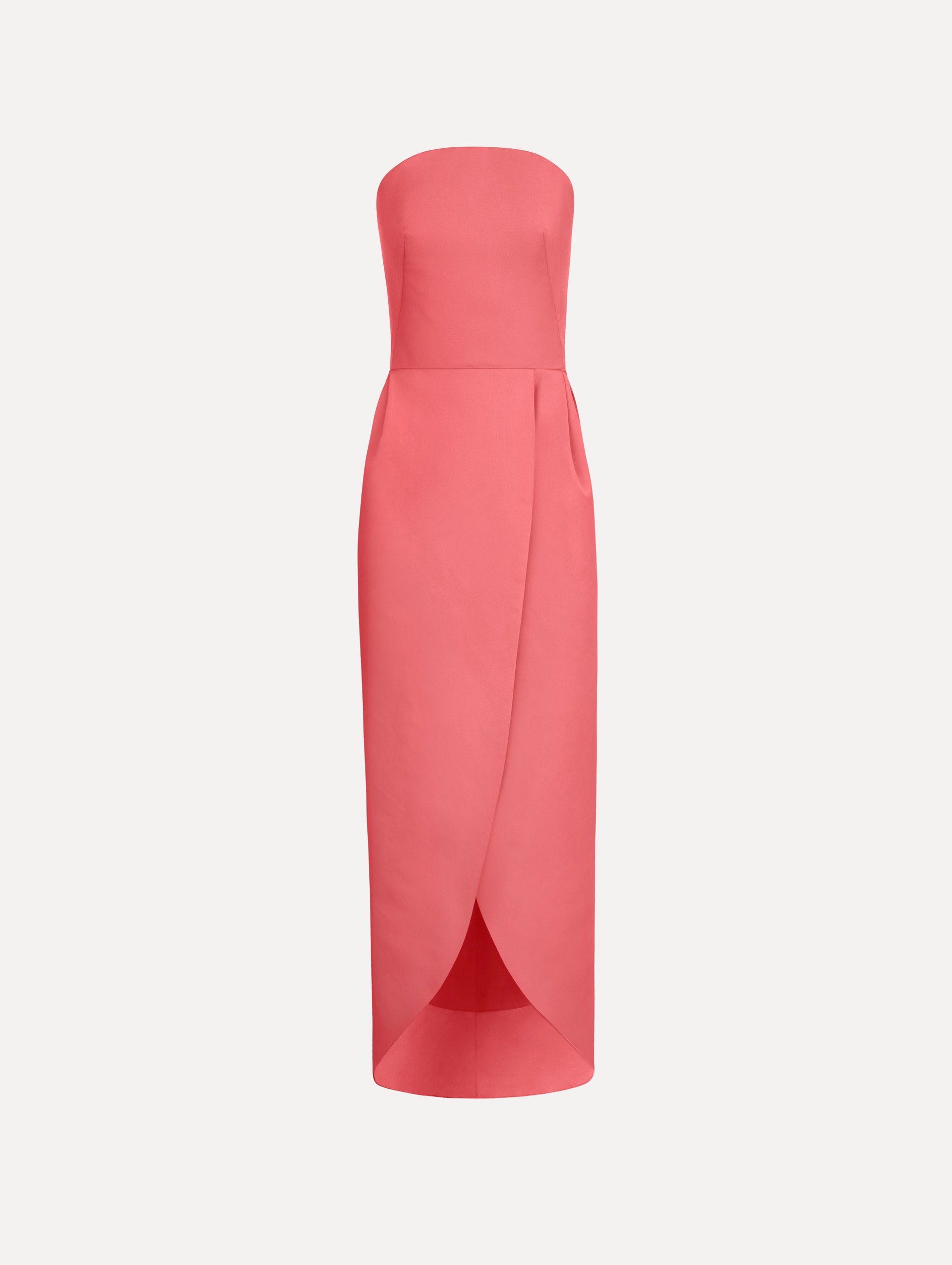 The Strapless Faille Gown in Guava Pink. Featuring a sculpted silhouette and wrap-style skirt with an asymmetrical hem. Front View.