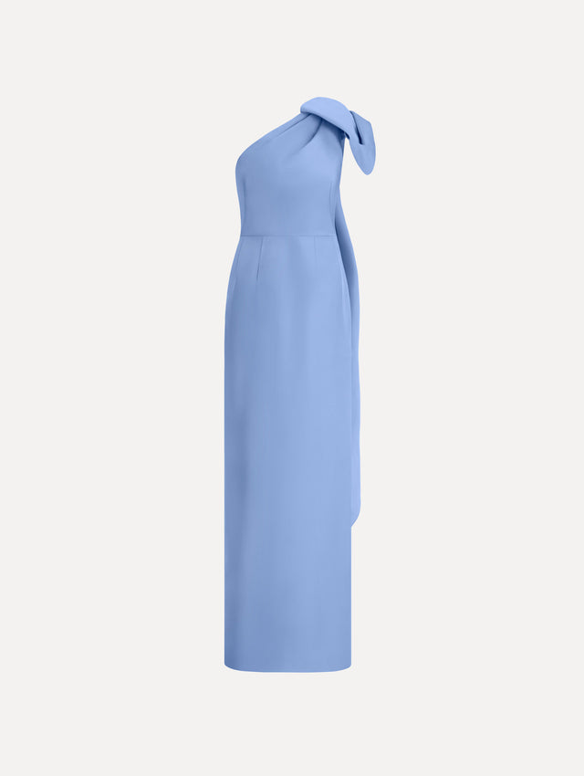 The Bow-Detail Faille Column Gown in a periwinkle blue. Featuring a column silhouette and sculptural bow detail at the shoulder. Front View.