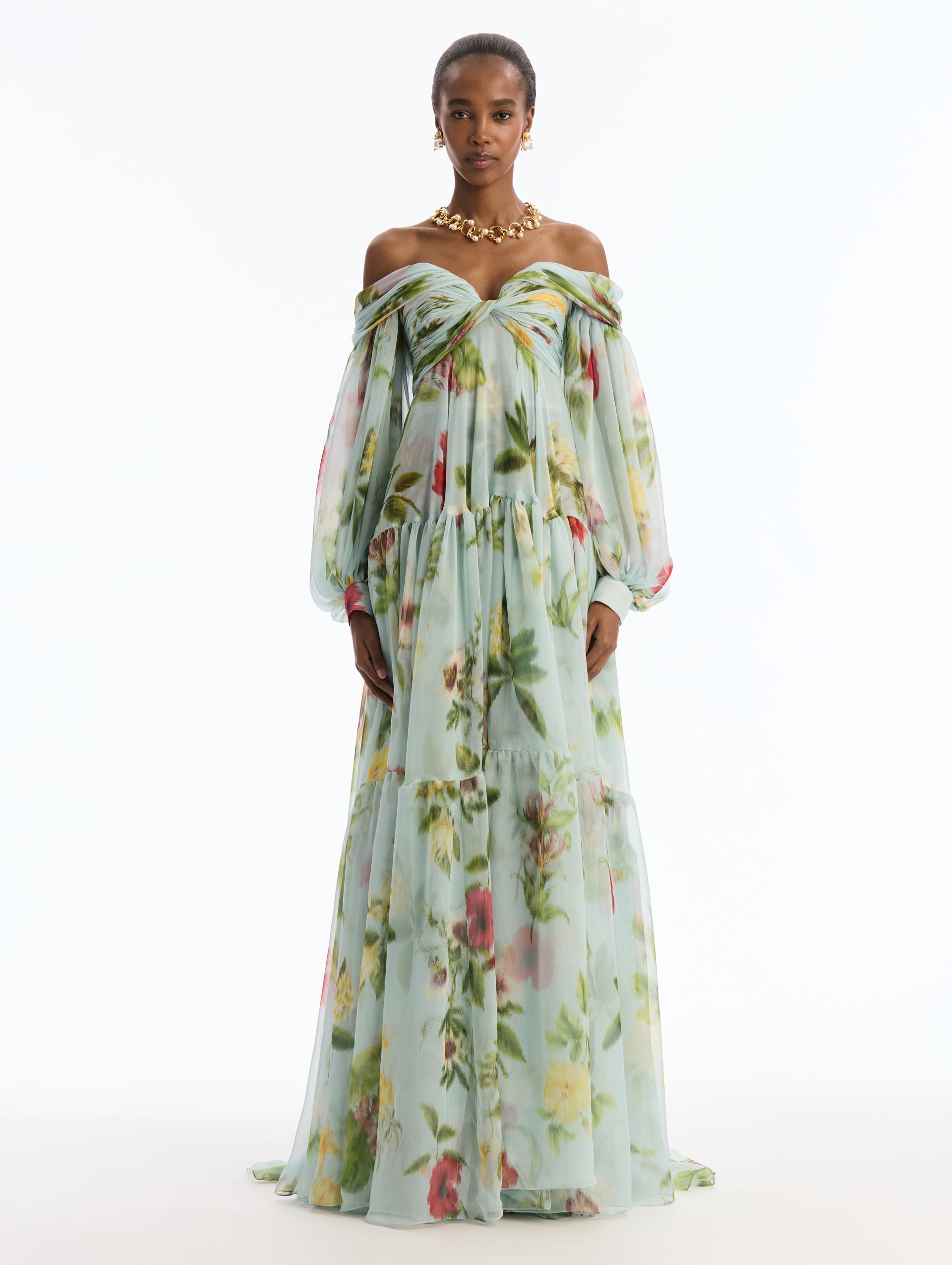 Strapless, Long Sleeve,  Light Blue,  Floor Length Chiffon Gown, with Chiné Dominican Mixed-Floral Print. Front View.