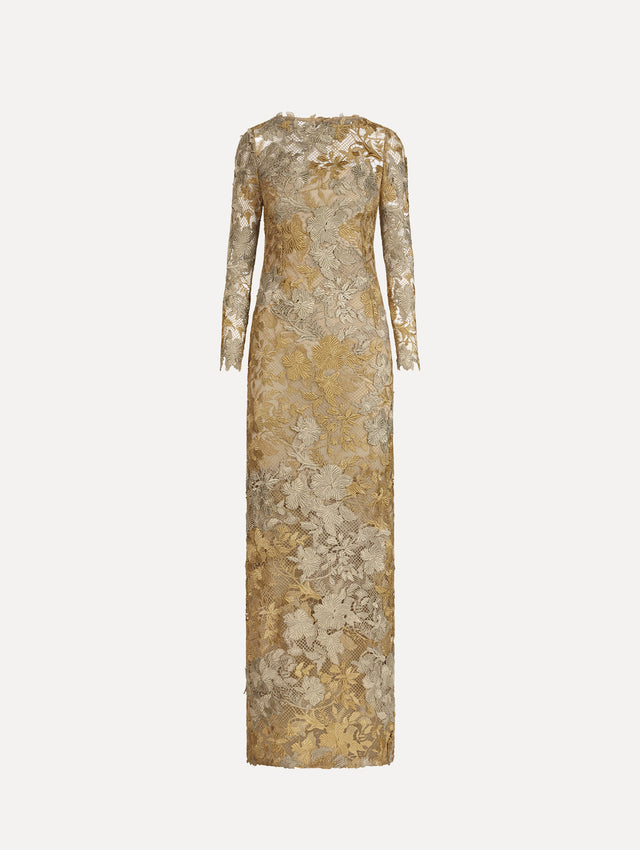 The Hibiscus Metallic Guipure Gown. Featuring metallic guipure lace, long sleeves, a fitted silhouette, and long skirt. Front View.