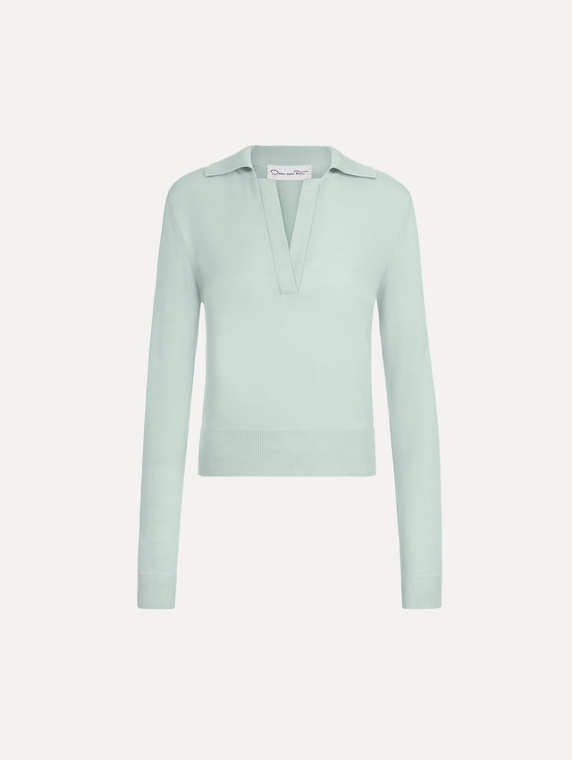 The Wool Polo Pullover in Saltwater Blue. Featuring an open color neckline, long sleeves, and ribbed trim. Front View.