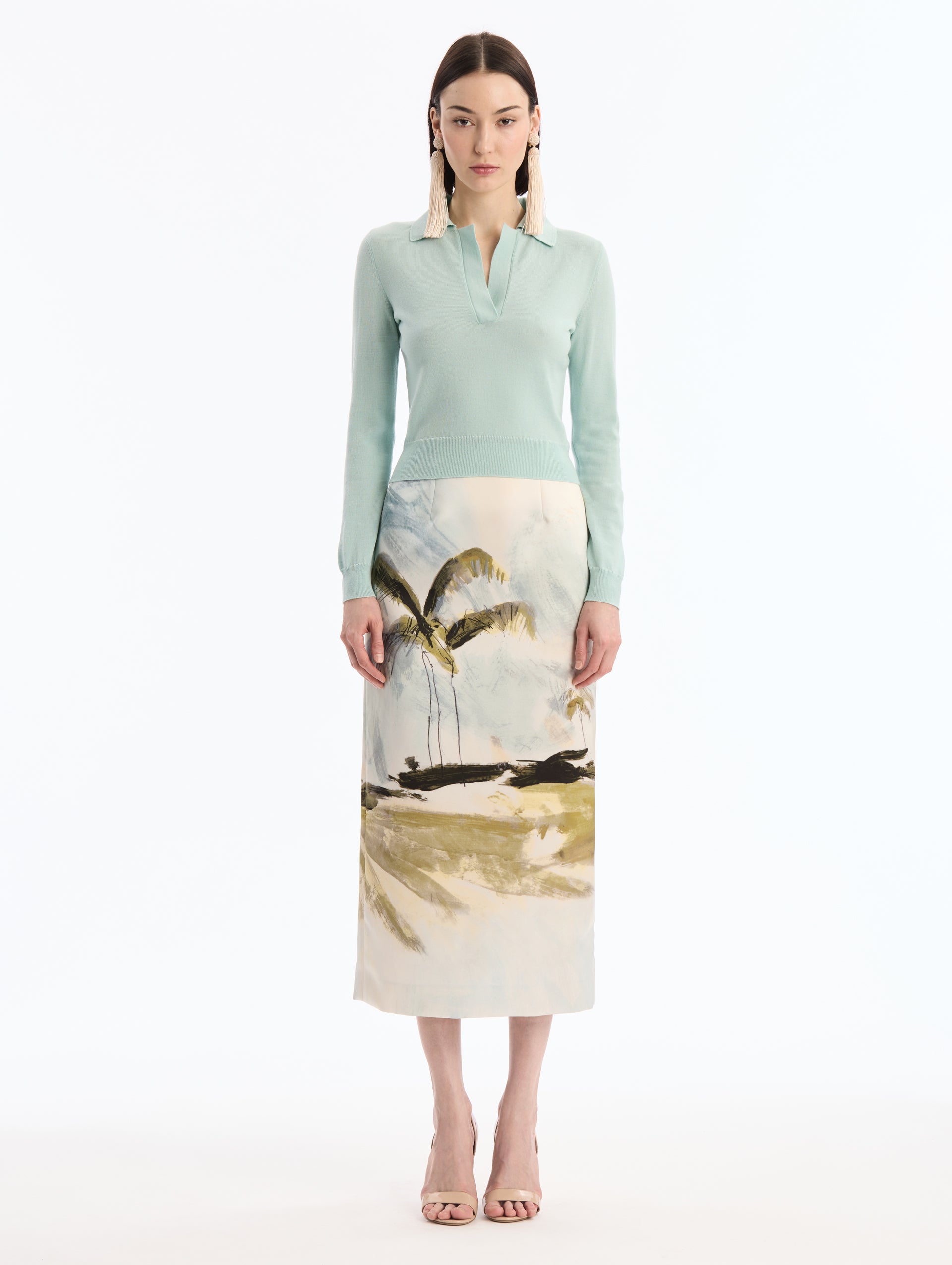 Light Blue Wool Polo Pullover, V-Neck with Collar. Full Length Sleeves. Close Up Front View.