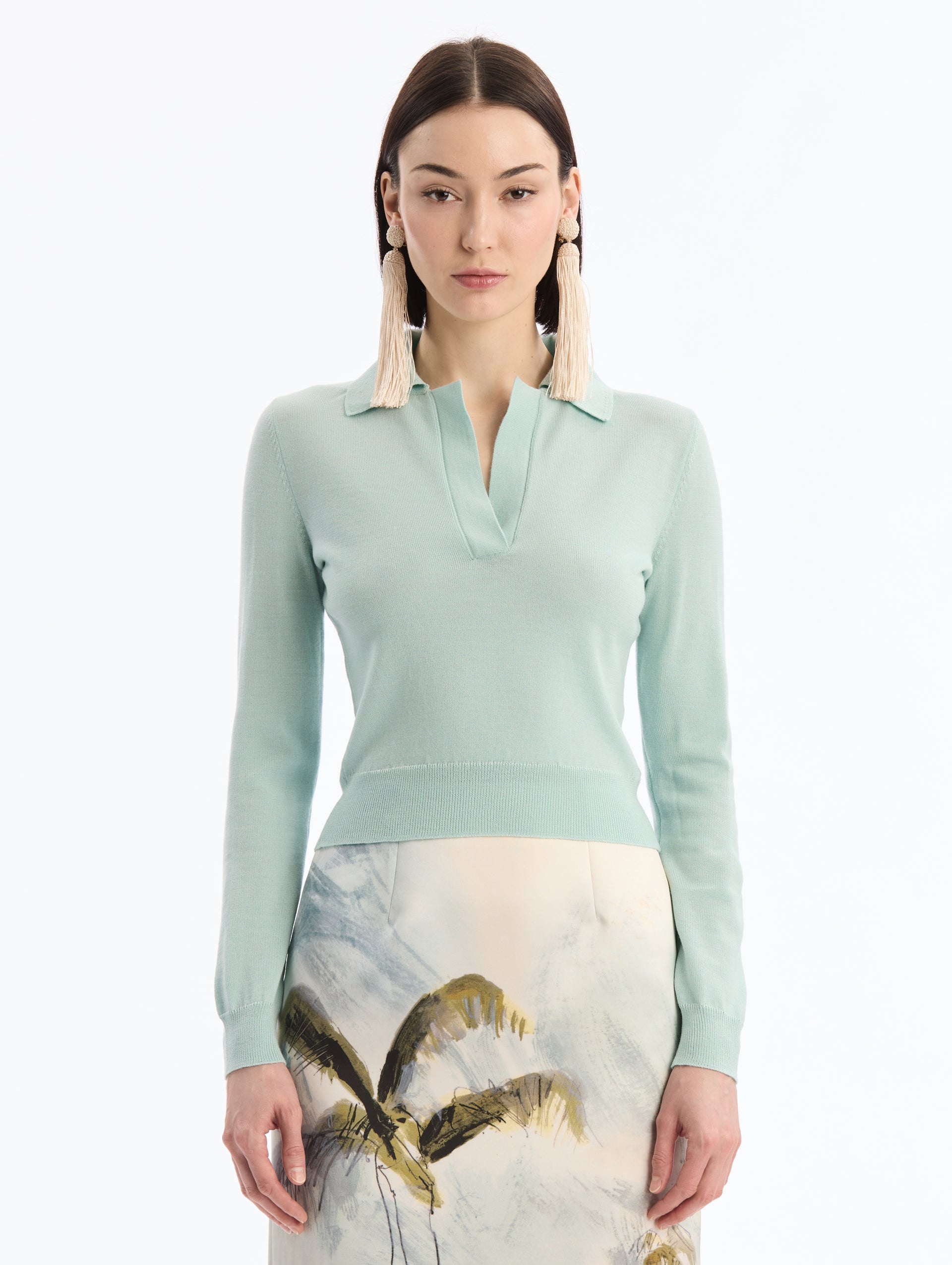 Light Blue Wool Polo Pullover, V-Neck with Collar. Full Length Sleeves. Close Up Front View. 