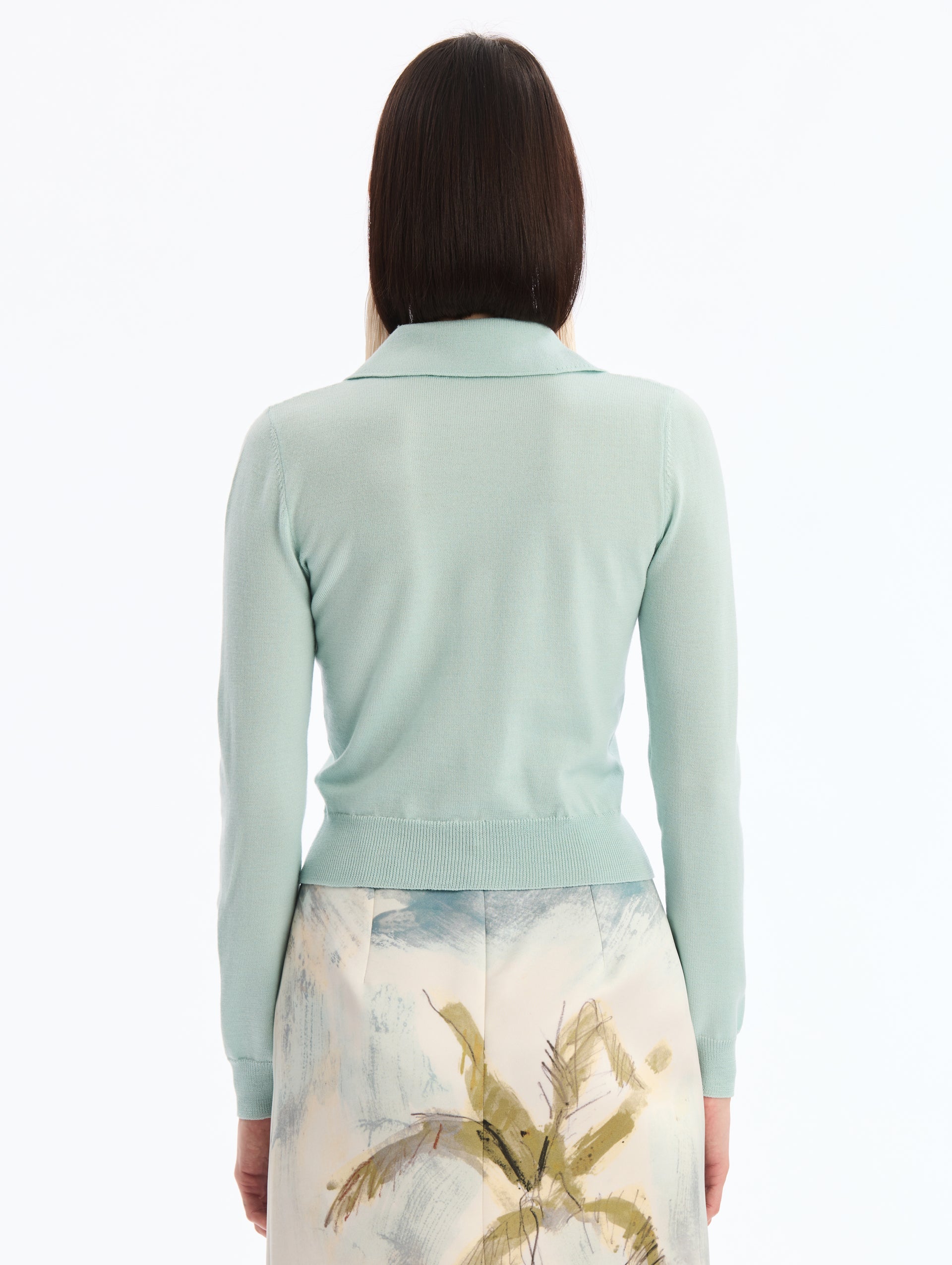 Light Blue Wool Polo Pullover, V-Neck with Collar. Full Length Sleeves. Back View.