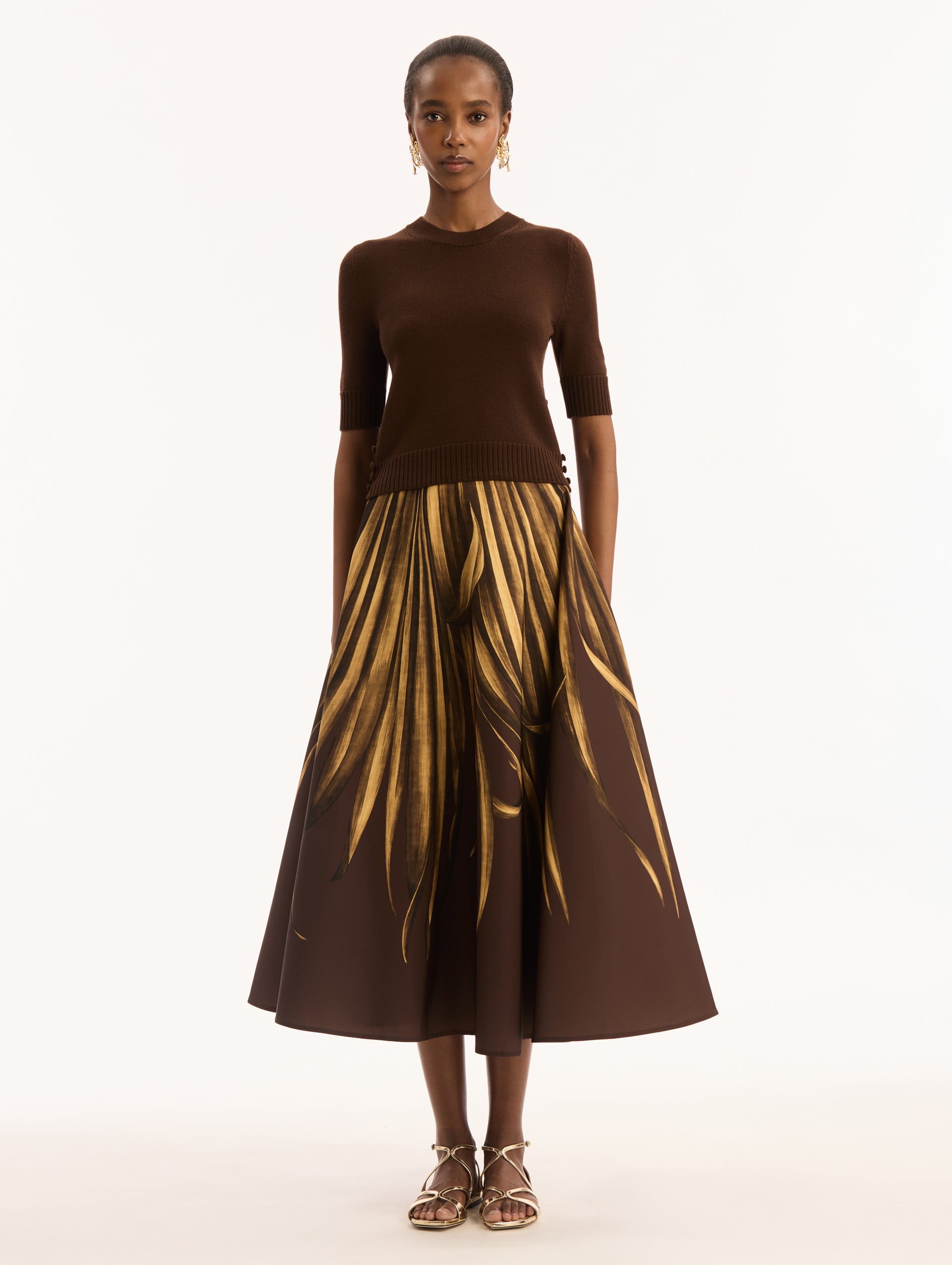 Dark Brown, Short Sleeve, Crew Neck, Pullover. Button Detailing on Side. Front View. 