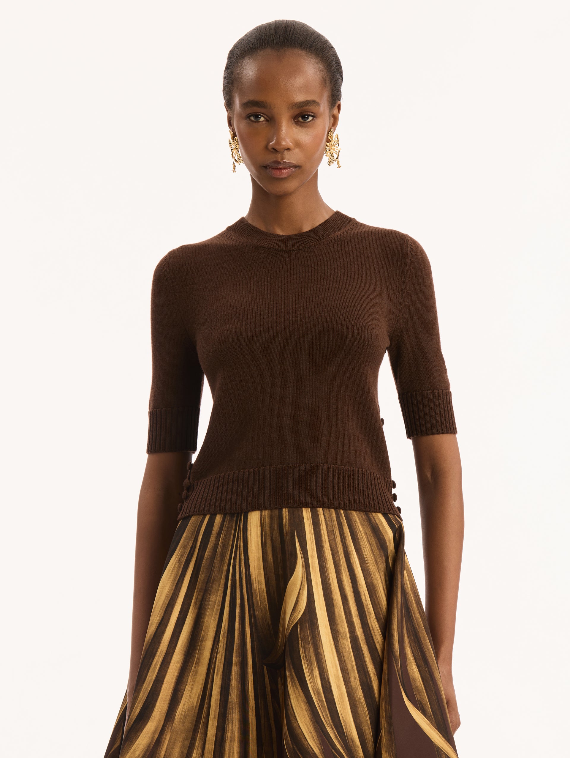 Dark Brown, Short Sleeve, Crew Neck, Pullover. Button Detailing on Side. Front View. 