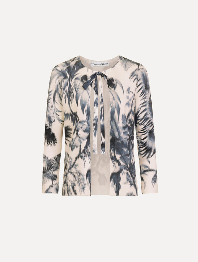 The Chiné Palm Leaves Cardigan in Navy and White. Featuring a crew neckline, quarter-length sleeves, banded trim, and tie front closure. Front View.