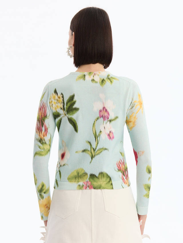 Light Blue Long Sleeve Cardigan with Chiné Dominican Mixed-Floral Print. Back View. 